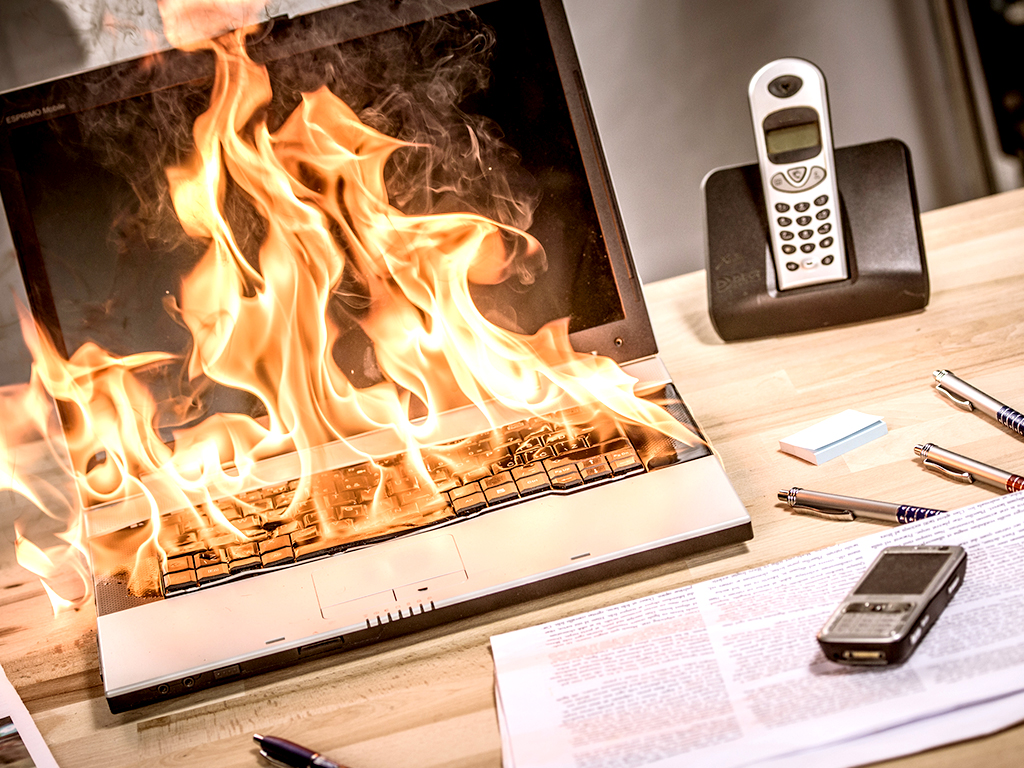 A laptop computer keyboard on fire on a home office desk, particulate matter can be introduced by many different methods, not all we have mentioned, including a laptop fire.