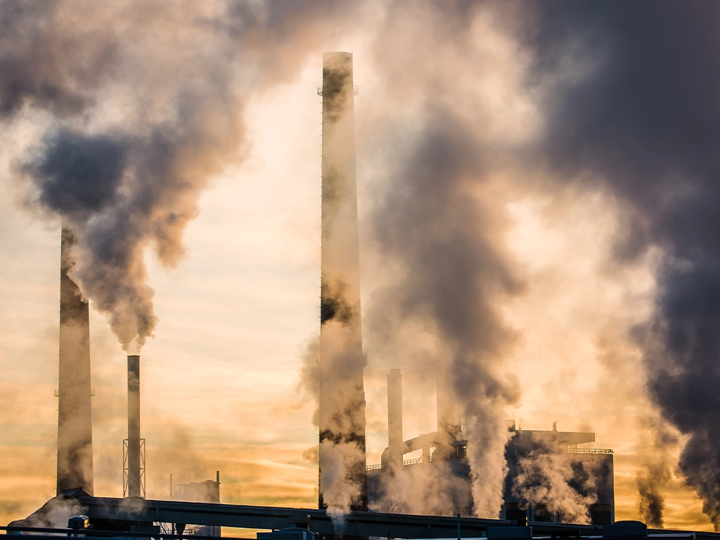 Smoke coming out of smoke stacks, air pollution has been linked to an increase in antibiotic resistance.